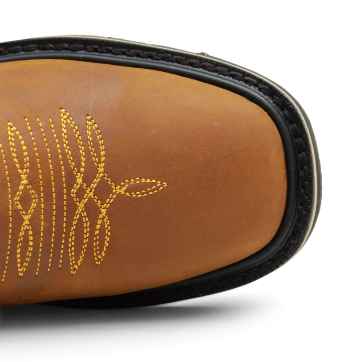 Bota de trabajo para hombre en piel color miel con punta cuadrada, bordado western y suela de doble densidad resistente. Toe