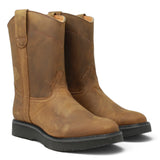 Bota de trabajo para hombre en color tang con punta redonda, caña media y suela de hule Mil Rayas resistente. Par